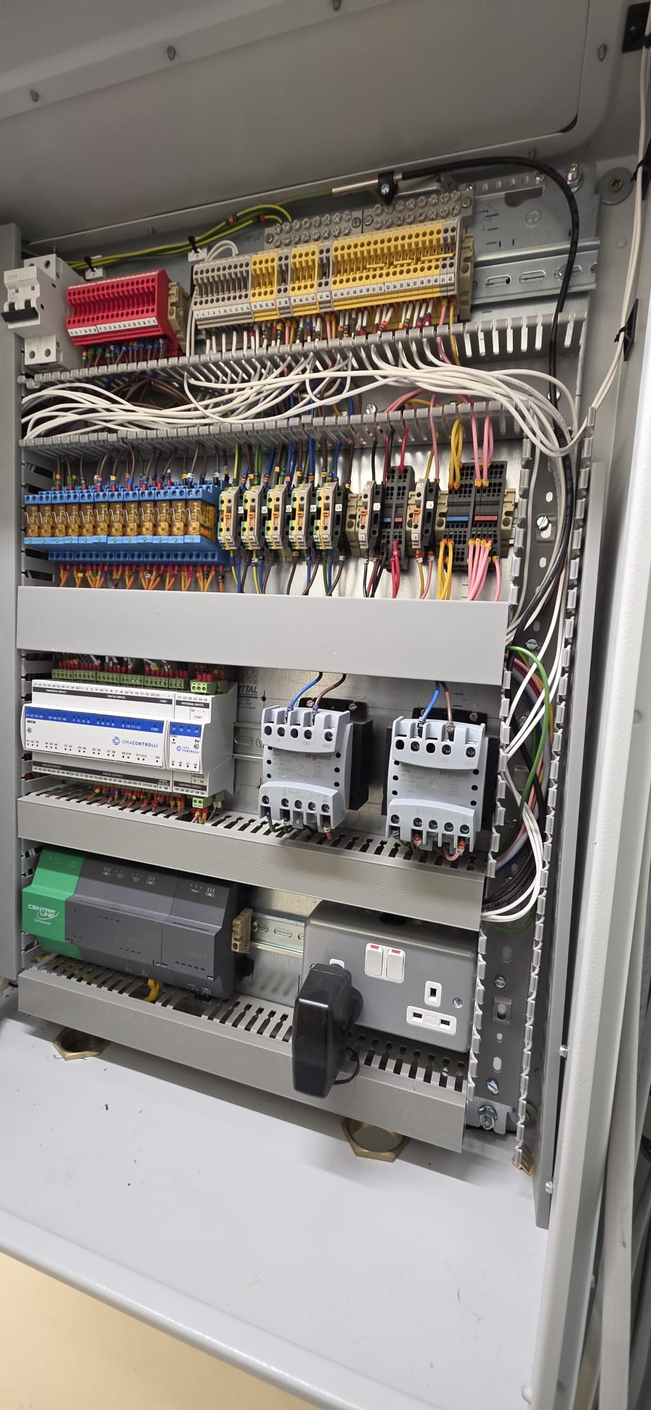 Antler controls cabinet showing terminal strips, relays, controllers and contactors.