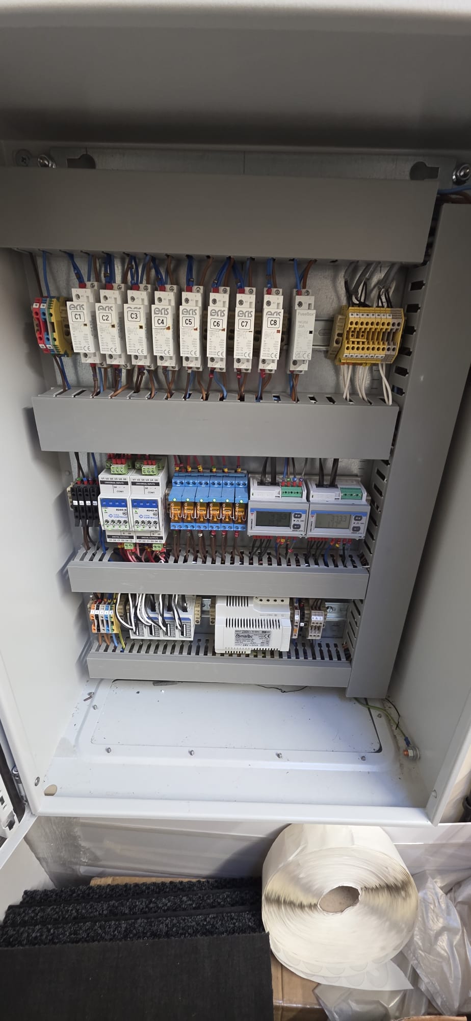 Antler energy-monitoring panel with current sensors, energy meters and connected wiring.